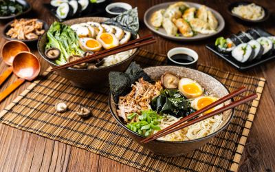 two beautiful bowls of ramen with a soft-boiled egg